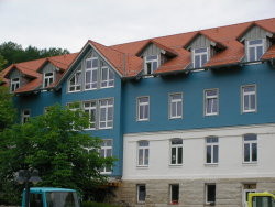 Erlacher Hoehe - Rundschindeln in Fichte - Elementsystem
