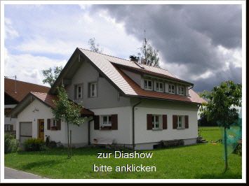 Einfamilienhaus mit Holzschindeln Einfamilienhaus mit Holzschindeln